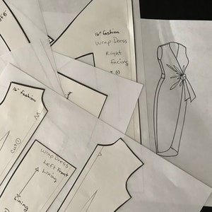 May include: A set of sewing patterns for a wrap dress, with instructions for cutting and attaching the pieces. The patterns are labeled with the text "16" fashion Wrap Dress" and "Part A", "Part B", "Lining", "Cut 1", "Right Facing", "Left Front", and "Front Left Facing".