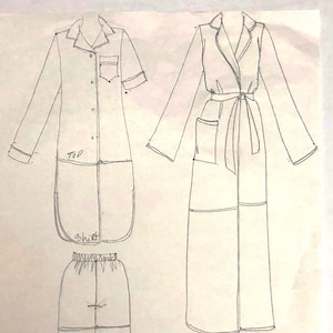 May include: Hand-drawn sketches of clothing designs for pajamas, shorts, pants, and a robe. The text reads "PJ's w/ TUNIC or SHIRT Length w/ short or long Sleeves Shorts or Pants Robe Long or Short".