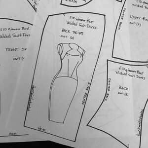 May include: Black and white line drawing pattern pieces for a dress. The pattern pieces are labeled "EID Glamour Bust Wicked Suit Dress" and include instructions for cutting and assembling the dress.