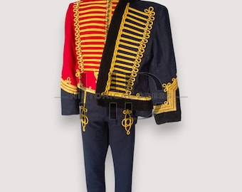 May include: A military-style uniform with a red jacket featuring gold trim and yellow stripes, paired with a navy blue jacket and matching pants. The uniform includes a black scarf. The text "HISTORICAL DRESS" is visible.