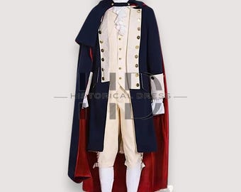 May include: A historical costume ensemble featuring a navy blue coat with gold buttons, a cream-colored vest, and matching breeches. The outfit includes a black hat, a white ruffled shirt, and a red cape. The text "HISTORICAL DRESS" is at the bottom.