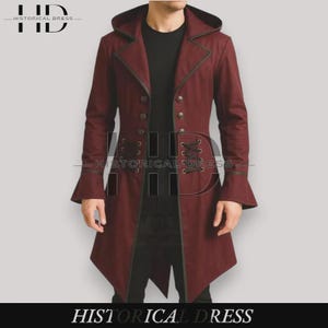 May include: Burgundy hooded coat with black trim and button details. The coat features a unique lace-up design on the front and flared sleeves. The text "HISTORICAL DRESS" is displayed at the top and bottom of the image.