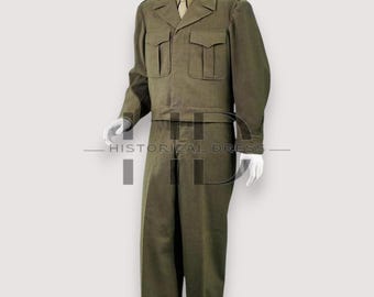 May include: Olive green military uniform, including a jacket with four front pockets and matching trousers. The jacket has a collared neckline and long sleeves. The uniform is displayed on a mannequin. The text "HISTORICAL DRESS" is at the bottom.