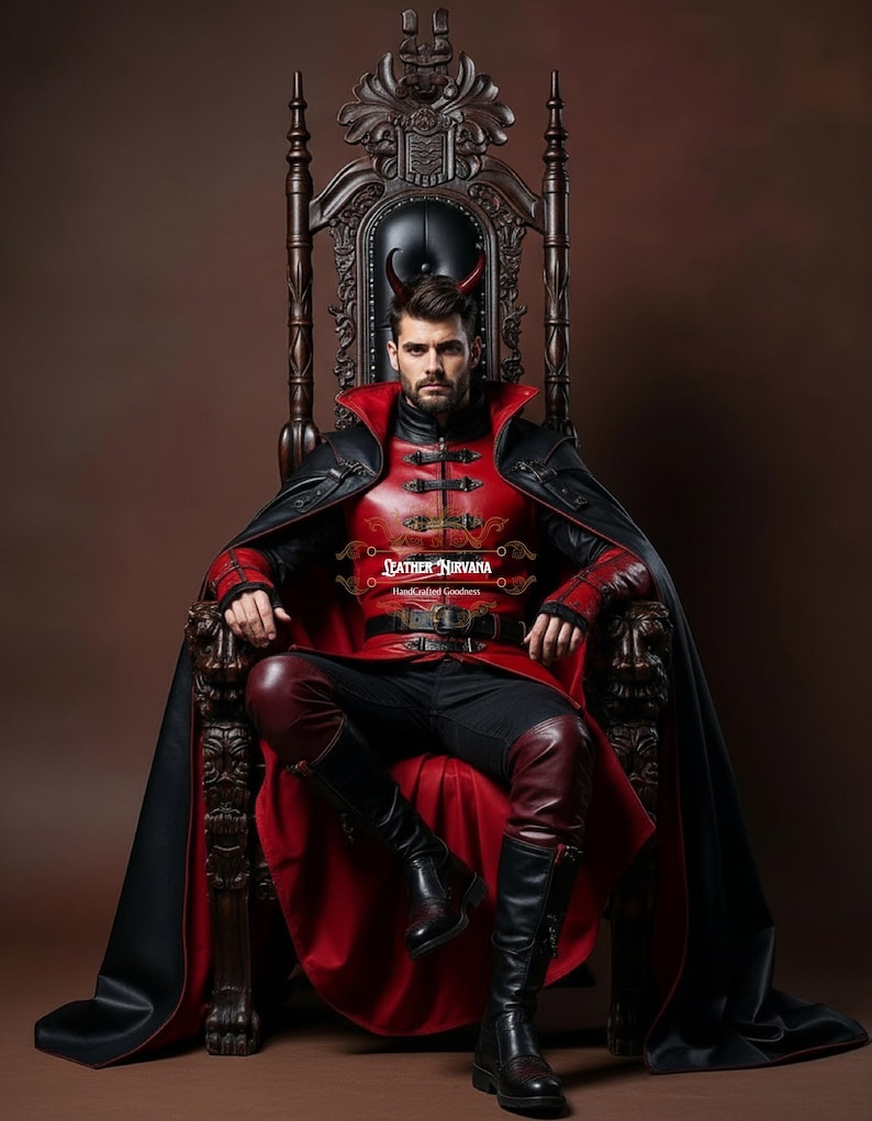 May include: A person wearing a red and black costume with a cape, sitting on a dark wooden throne. The costume includes a red jacket, black pants, and knee-high black boots. The image includes the text "LEATHER NIRVANA Handcrafted Goodness".