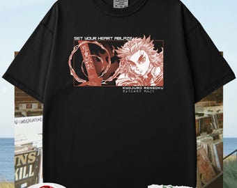 May include: Black t-shirt with a red graphic of a character with spiky hair and the text "SET YOUR HEART ABLAZE" and "KYOJURO RENGOKU" in a rectangular design. The shirt is a Comfort Colors brand.