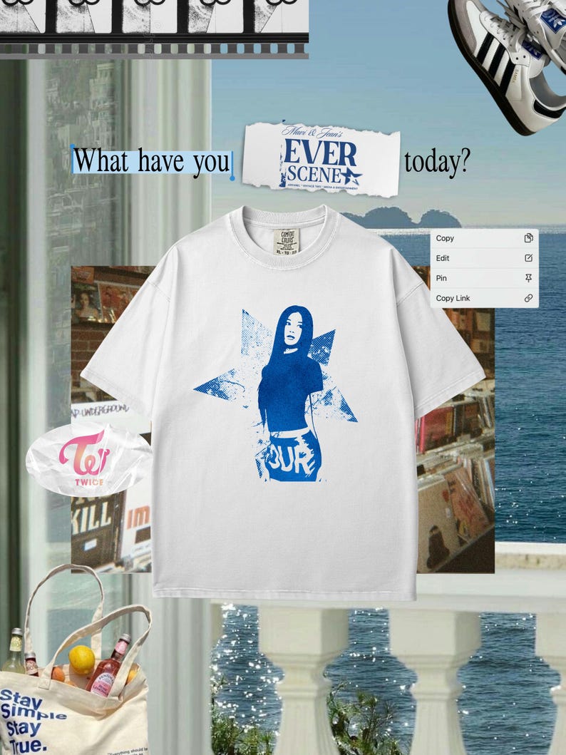 May include: White t-shirt featuring a blue graphic of a woman and a star, with the word "FOUR" below. The image also includes the text "What have you" and "EVER SCENE today?"