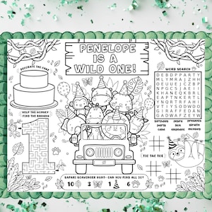 May include: A black and white printable activity sheet featuring the text 'PENELOPE IS A WILD ONE!' with illustrations of safari animals in a jeep, a two-tier cake, a number one maze, a word search, and a tic-tac-toe game for a first birthday.