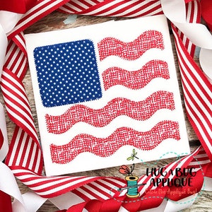 May include: A red, white, and blue embroidered American flag design with a wavy pattern for the stripes. The design is on a white background.