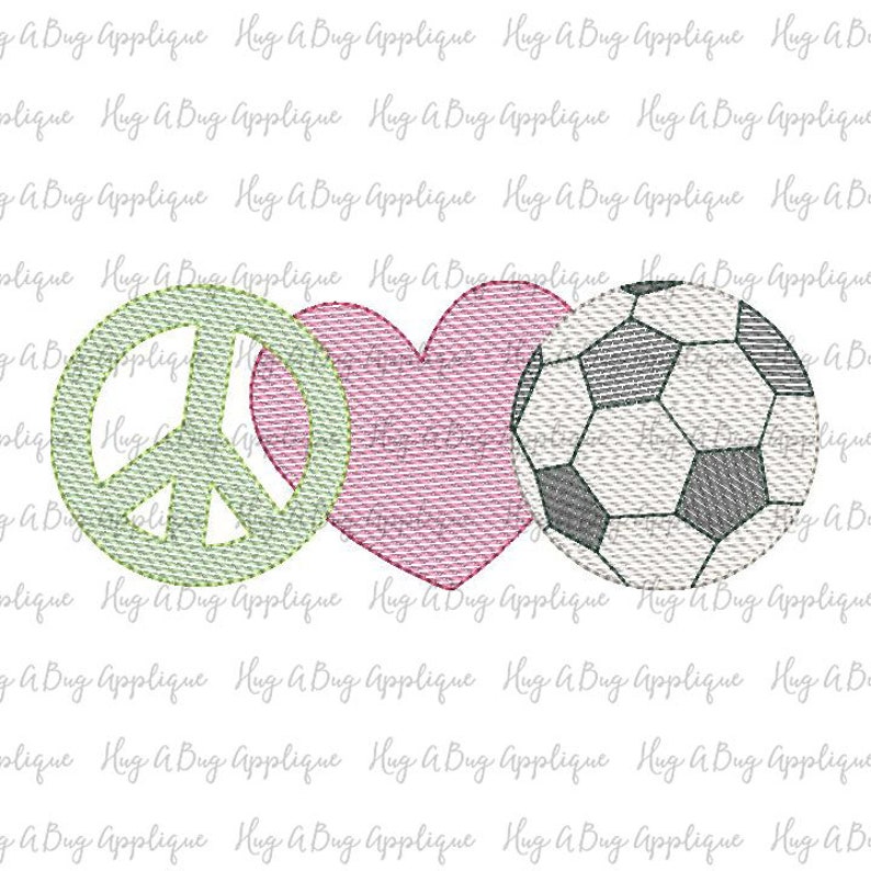 May include: An embroidered design featuring a green peace sign, a pink heart, and a soccer ball with black and white panels. The design is likely for an applique or patch, suitable for fabric projects.