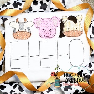May include: A white fabric with three embroidered animal faces: a cow, a pig, and a horse. Below the animals are three blank spaces with lines for writing. The text "HUGA BUG APPLIQUE" is at the bottom of the fabric.
