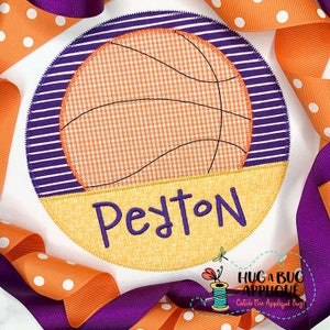 May include: A purple, white, and orange appliqué of a basketball with the name Peyton stitched in purple on a yellow background.