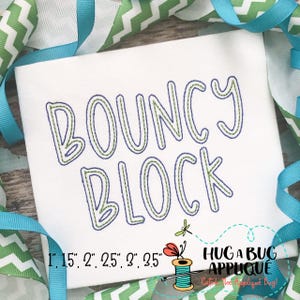 May include: A white embroidery design with the text "BOUNCY BLOCK" in a blue and green outline. The design is available in sizes 1.5", 2", 2.25", 2.5", and 3".