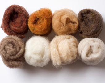May include: Eight balls of wool yarn in various shades of brown, beige, and white. The yarn is arranged in a row on a white surface.