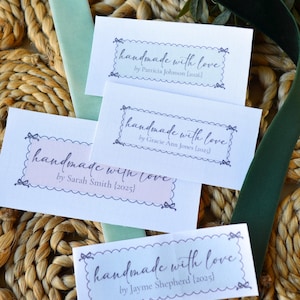 Sew-in label with scalloped border and delicate script font