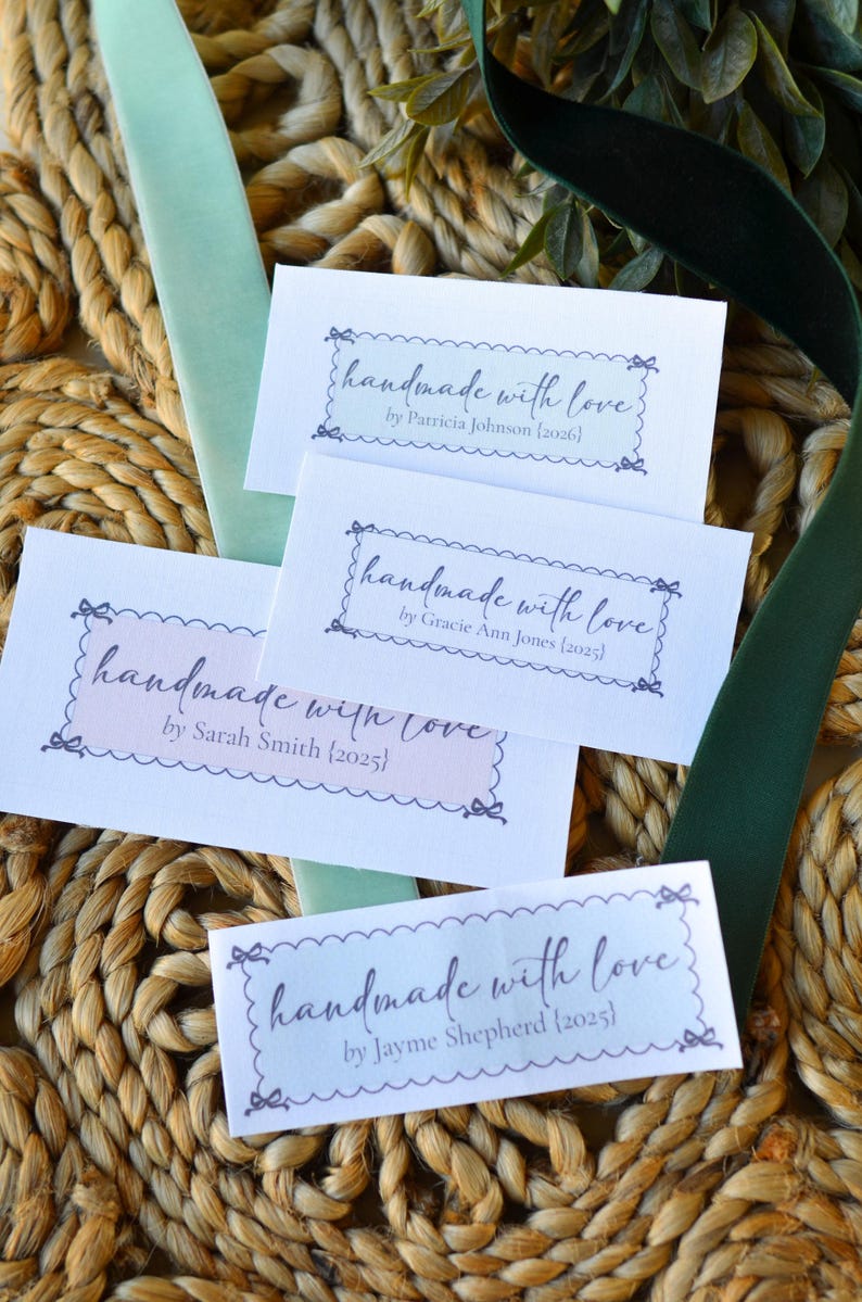 Sew-in label with scalloped border and delicate script font