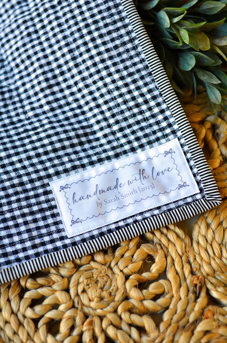 Personalized handmade with love sewing label on black gingham fabric