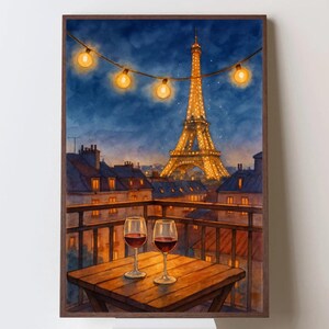 May include: Watercolor painting of the Eiffel Tower at night, with string lights and a table set for two. Two glasses of red wine sit on a wooden table on a balcony overlooking the illuminated tower and Parisian rooftops. The artwork is framed.