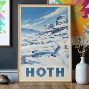 May include: A vertical rectangular art print featuring a snowy landscape with rocky cliffs, a large spherical structure, and small cylindrical towers. The word HOTH is printed in large, bold, blue capital letters at the bottom of the print.