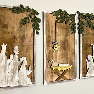 3ピースの額入り木製キリスト降誕像