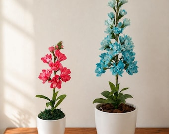 Pianta realizzata a mano con carta crespa. Fiore a lunga durata, perfetto per decorare o da regalare.