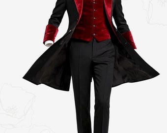 May include: A black tailcoat suit featuring a deep red velvet lapel and matching red velvet cuffs. The ensemble includes a buttoned red velvet waistcoat and black trousers. The garment is displayed on a mannequin with the text Aairah Stitch visible.