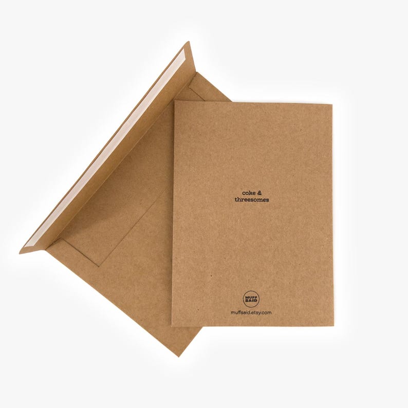 May include: A brown greeting card and envelope set. The card reads "cake & threesomes" in a simple black font. The envelope is open, revealing the adhesive strip. The Etsy shop's logo and website are printed on the card.