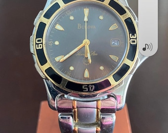 Womens Bulova wrist watch, Marine Star 100 Mwter, quartz two tone Stainless Steel 26-31mm