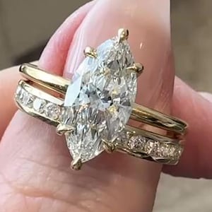 Förlovningsringar i Marquise Moissanit, stapelringar i 14k guld och silver