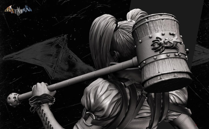 May include: A grayscale image of a figure holding a large wooden mallet. The mallet has metal bands and a decorative emblem. The figure is wearing a detailed costume, and the image has a dark, dramatic background. The Batman logo is visible in the upper left corner.