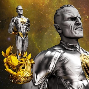 May include: A detailed statue of a stern-faced, silver-skinned figure with a gold emblem on the chest. A smaller statue of the same character stands on a golden, ornate base. The background is a cosmic scene.