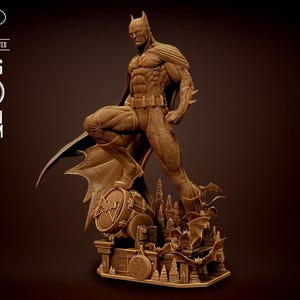 May include: A detailed brown resin statue of Batman, posed heroically atop a Gotham City-themed base. The statue is 1/6 scale and features intricate detailing of the character's costume and physique. The image includes the Batman logo and text indicating it is pre-supported.