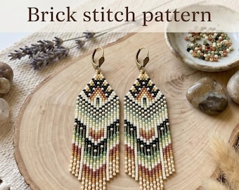 May include: A pair of beaded earrings with a geometric pattern in shades of beige, black, green, and brown. The earrings are displayed on a wooden slice with the text "DIGITAL DOWNLOAD Brick stitch pattern".