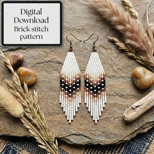 May include: Two beaded earrings with a brick stitch pattern. The earrings have a white, tan, black, and brown geometric design. The image also includes a digital download sign that says "Digital Download Brick stitch pattern".
