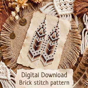 May include: A pair of long, pointed earrings crafted from small beads in a geometric pattern of white, tan, and dark brown. The earrings feature a brick stitch design and are displayed on a piece of paper with the text Digital Download Brick stitch pattern.