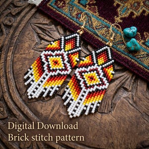 May include: A pair of beaded earrings featuring a geometric diamond pattern in shades of red, orange, yellow, white, and black. The earrings have gold-toned metal hooks and are accented with small, light blue, marbled turquoise-colored beads.