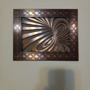 Solid copper vent cover with abstract pattern, patina and wax