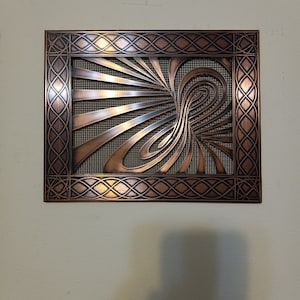 Solid copper vent cover with abstract pattern, patina and wax