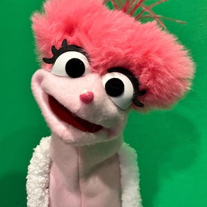 Puppet in pink small fit.