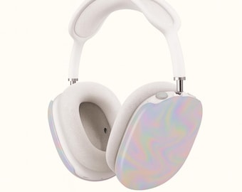 May include: White over-ear headphones with a pearlescent, swirling design on the earcups. The headband and ear cushions are white. The headphones have a modern, sleek design.