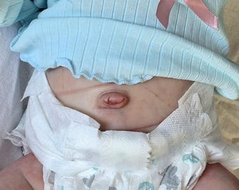 Belly plate for dolls