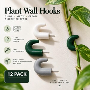 May include: A 12-pack of plant wall hooks in white, dark green, and gray. Each hook features a curved design with a metal pin for installation. Text on the image reads: Plant Wall Hooks, Guide Grow Create A Greener Space, 12 Pack, Small Hooks Big Plant Vibes.