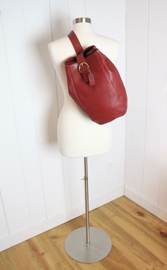 coach red sling bag
