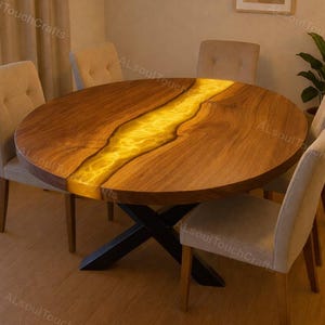 May include: A round wooden dining table with a yellow resin river design. The table is surrounded by six beige upholstered chairs. The table has a black metal base. The text "Alsoul TouchCrafts" is visible in the image.