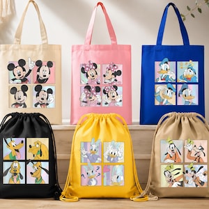 May include: A collection of six tote bags and drawstring bags in various colors including beige, pink, blue, black, yellow, and tan. Each bag features a four-panel graphic print of classic Disney characters like Mickey, Minnie, Donald, Daisy, Pluto, and Goofy.