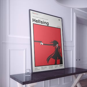 May include: A framed poster for the anime series "Hellsing." The design features a red backdrop with a black silhouette of a character aiming a gun. The title "Hellsing" is in white, with the year 1997 also displayed.