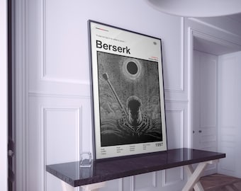 May include: A framed black and white poster with the title "Berserk". The artwork shows a detailed illustration of a figure with a large sword, set against a dark, celestial background. The poster includes the year 1997.