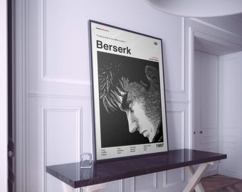 May include: A framed black and white poster with the word "Berserk" in a minimalist design. The poster features a detailed illustration of a person's profile. Additional text includes the year 1997 and other names.