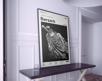 May include: A framed black and white poster with the word "Berserk" at the top. The poster shows a detailed illustration of a character with a large sword and cape. The year 1997 is visible at the bottom.
