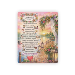 May include: A rectangular jigsaw puzzle featuring a sunset lake scene with a wooden dock, floral arches, and lanterns. The text 1 Corinthians 13:4-8 is printed in the centre, surrounded by small illustrations of children and animals.