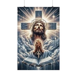 May include: A religious art print depicting a figure with long hair, a crown of thorns, and a cross in the background. The figure is praying over an open book, with a cross on the chest. The artwork features a celestial background.